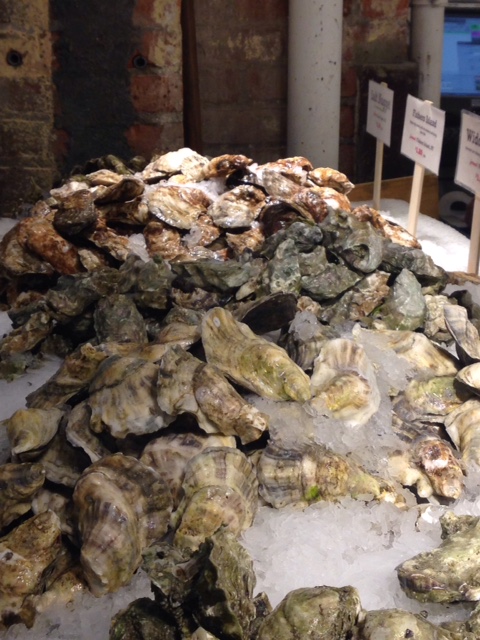 At Chelsea Market in New York City, displays show where seafood is harvested. 